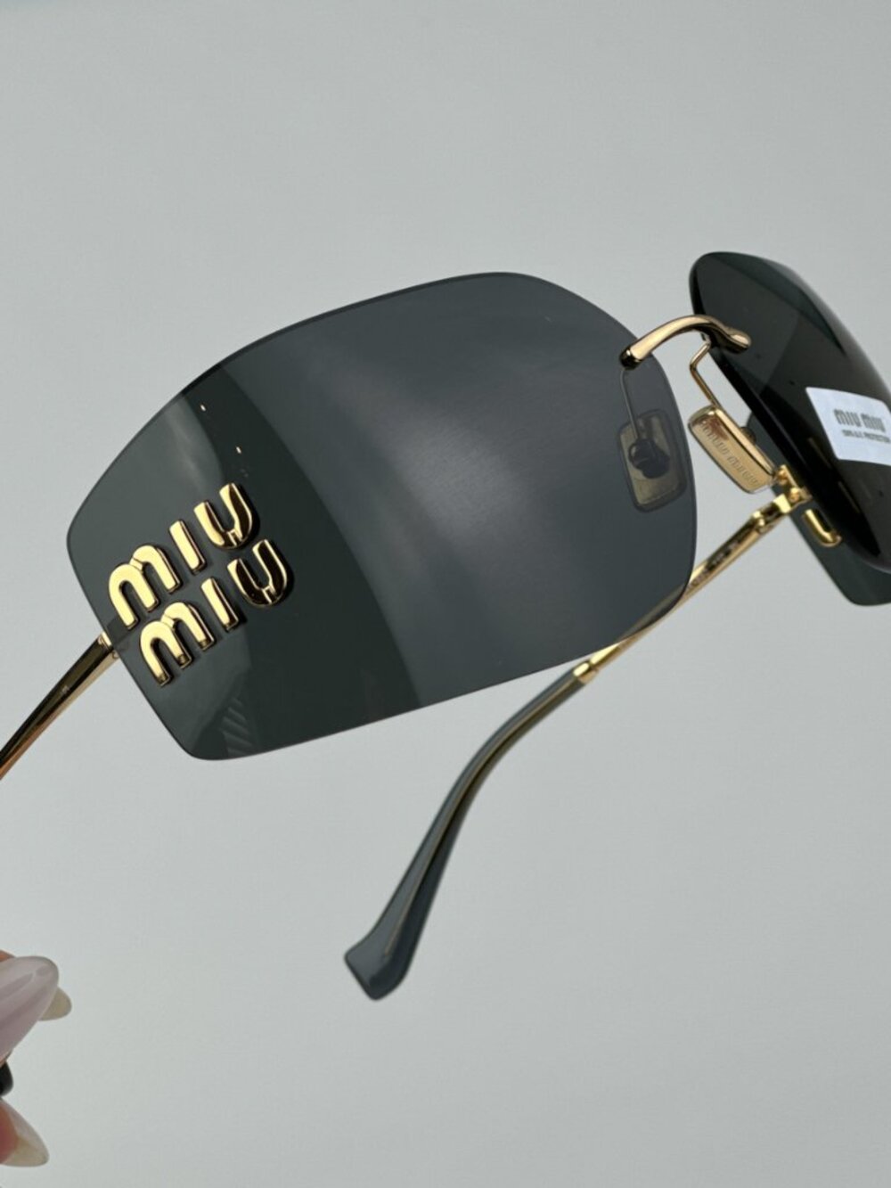 MIU MIU MU54YS 5AK5S0 GOLD WRAPAROUND SUNGLASSES
